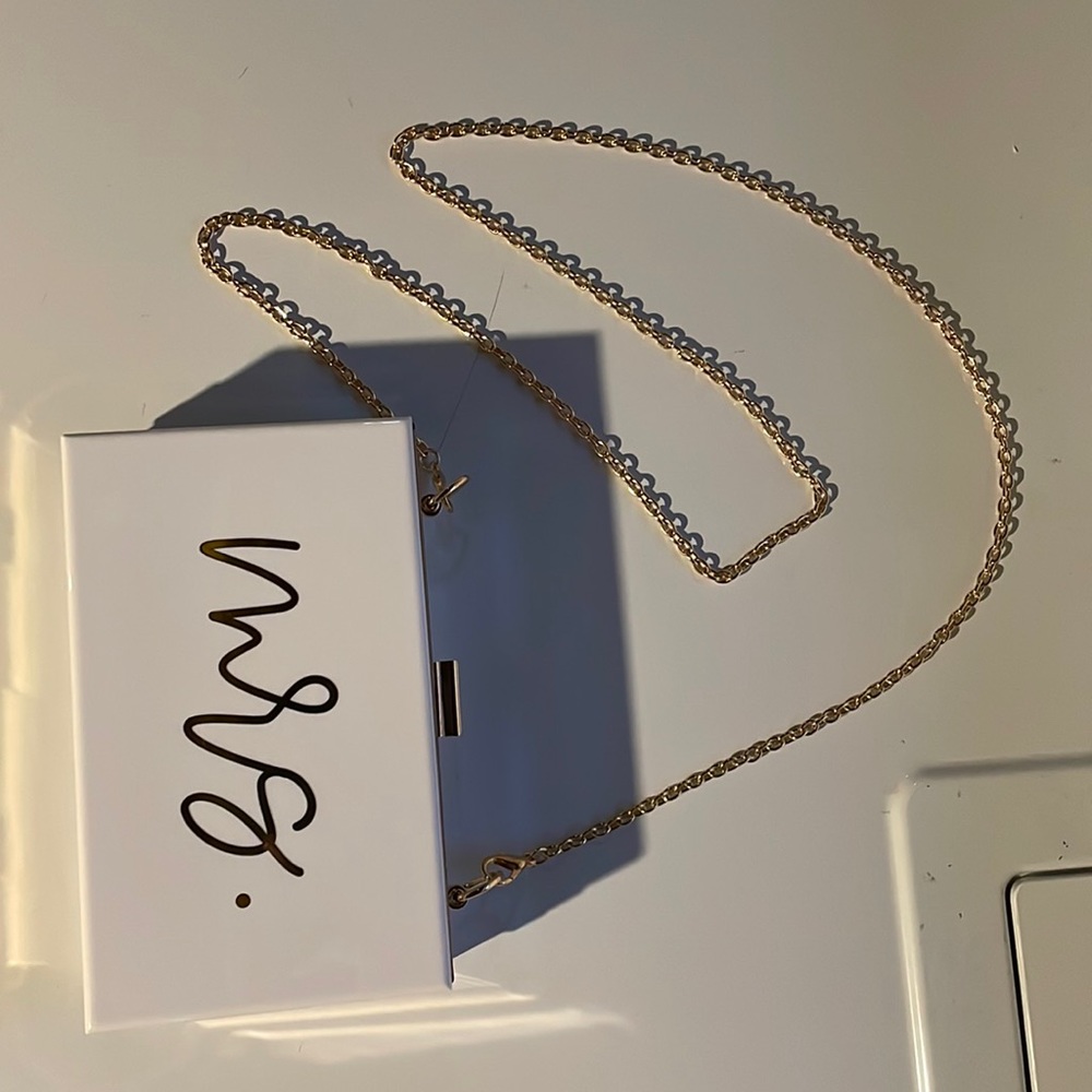 Mrs purse with gold chain! Only used once for my bridal shower.